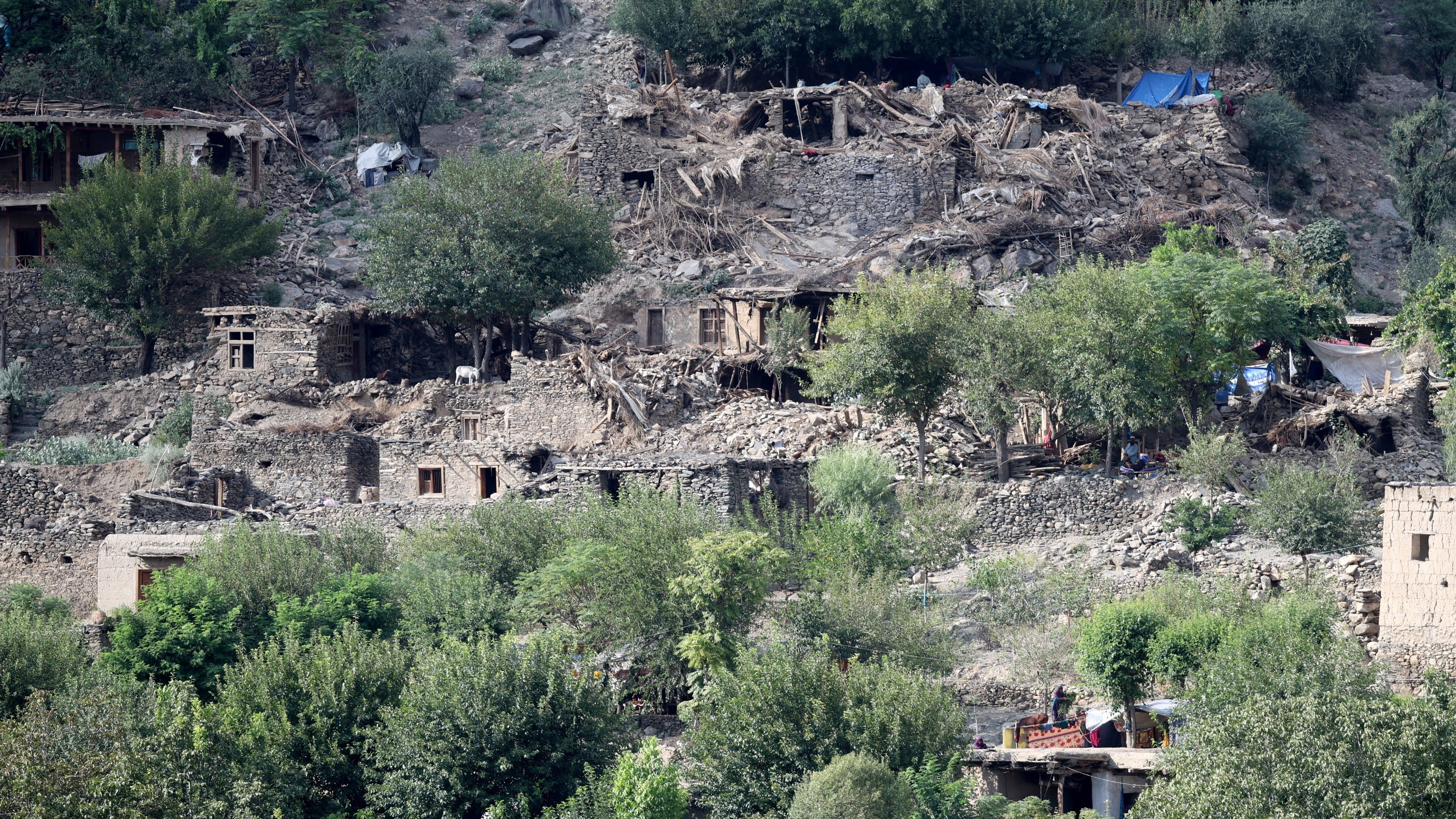 Casas destruídas na aldea de Masud, na provincia de Kunar. REUTERS/Sayed Hassib