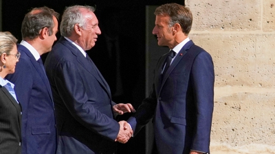 François Bayrou e Emmanuel Macron (Christophe Ena / Pool via REUTERS)