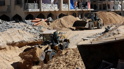 Búsqueda dos restos de reféns en Khan Yunis. REUTERS/Ramadan Abed