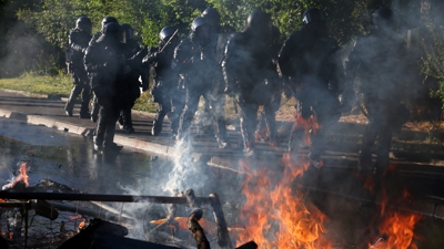 Policías en Xenebra. REUTERS/Umit Bektas