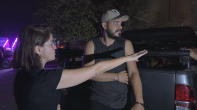 José Taberneiro agarda noticias da súa irmá Adela, do seu cuñado e dos seus sobriños a carón dos restos do edificio da Guaira onde estaban aloxados.