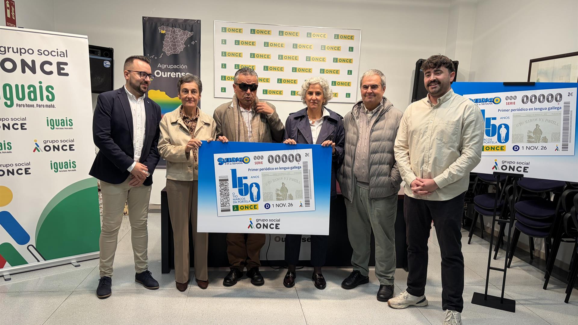 O delegado da ONCE en Galicia, Manuel Martínez Pan, e a presidenta do Consello da Cultura Galega, Dolores Vilavedra, entre outros, presentan en Ourense o cupón da ONCE dedicado ao 150 aniversario de 'O Tío Marcos da Portela'- CONSELLO DA CULTURA GALEGA